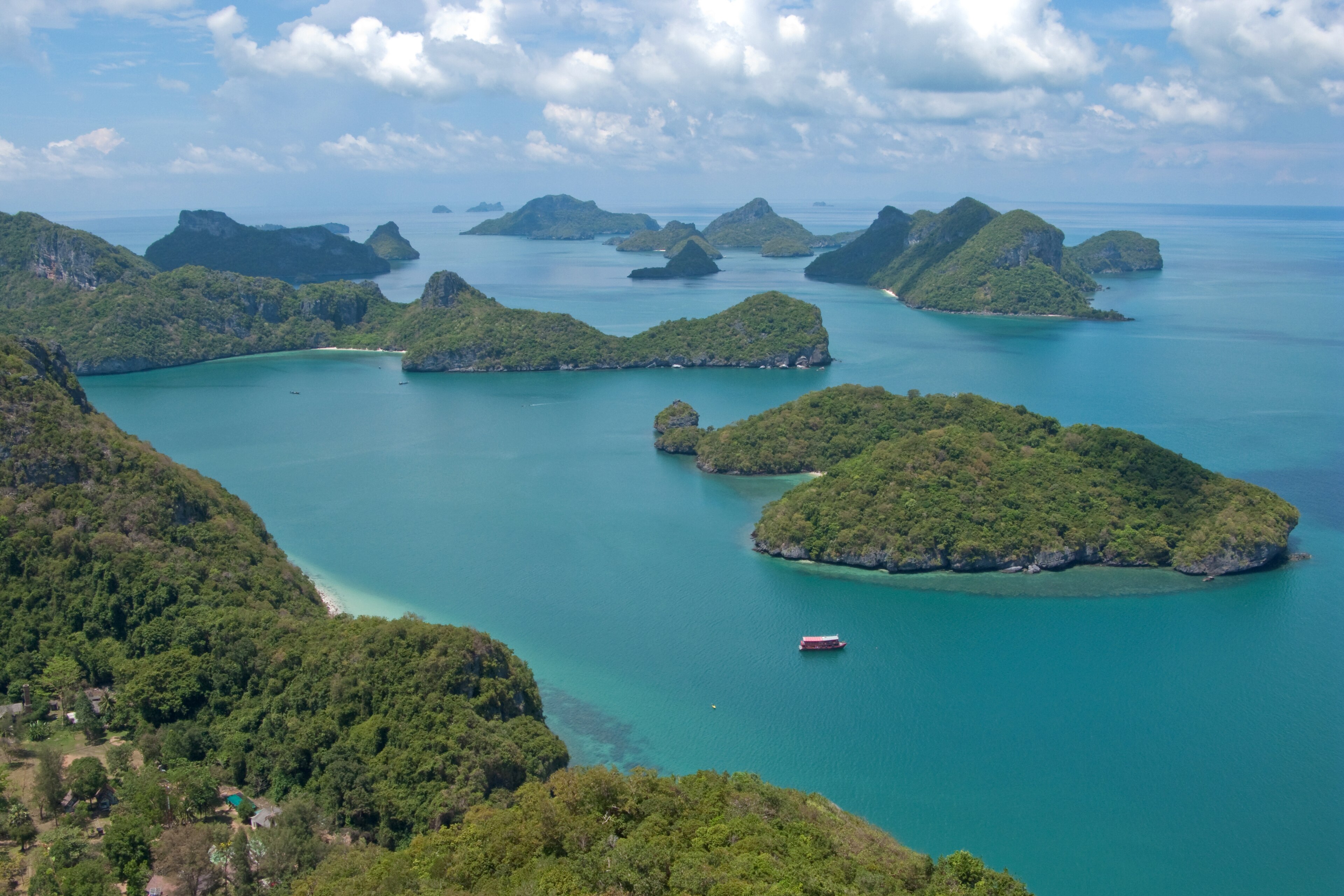 Limestone islands rising from turquoise water in Mu Ko Ang Thong, Thailand